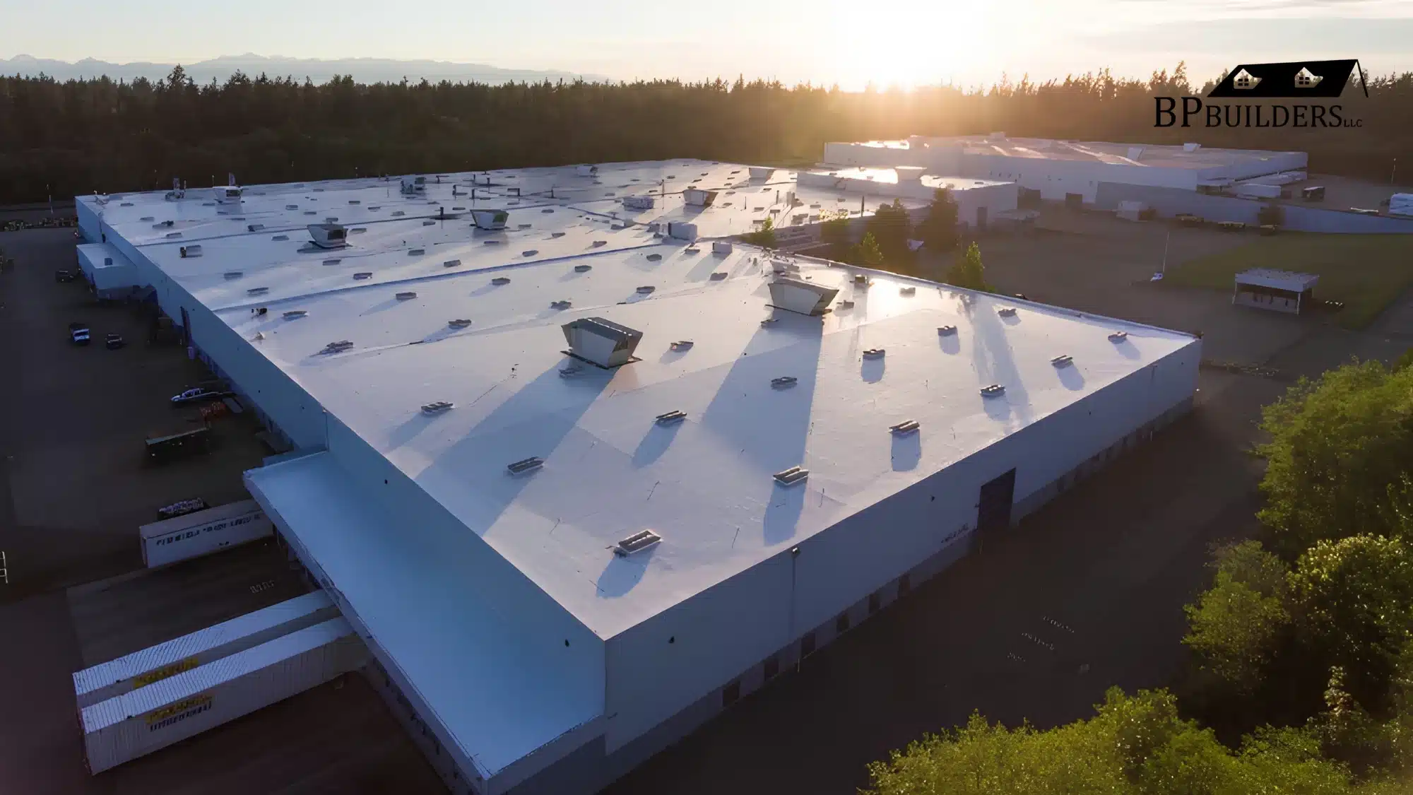 A commercial roof undergoing professional restoration to extend lifespan