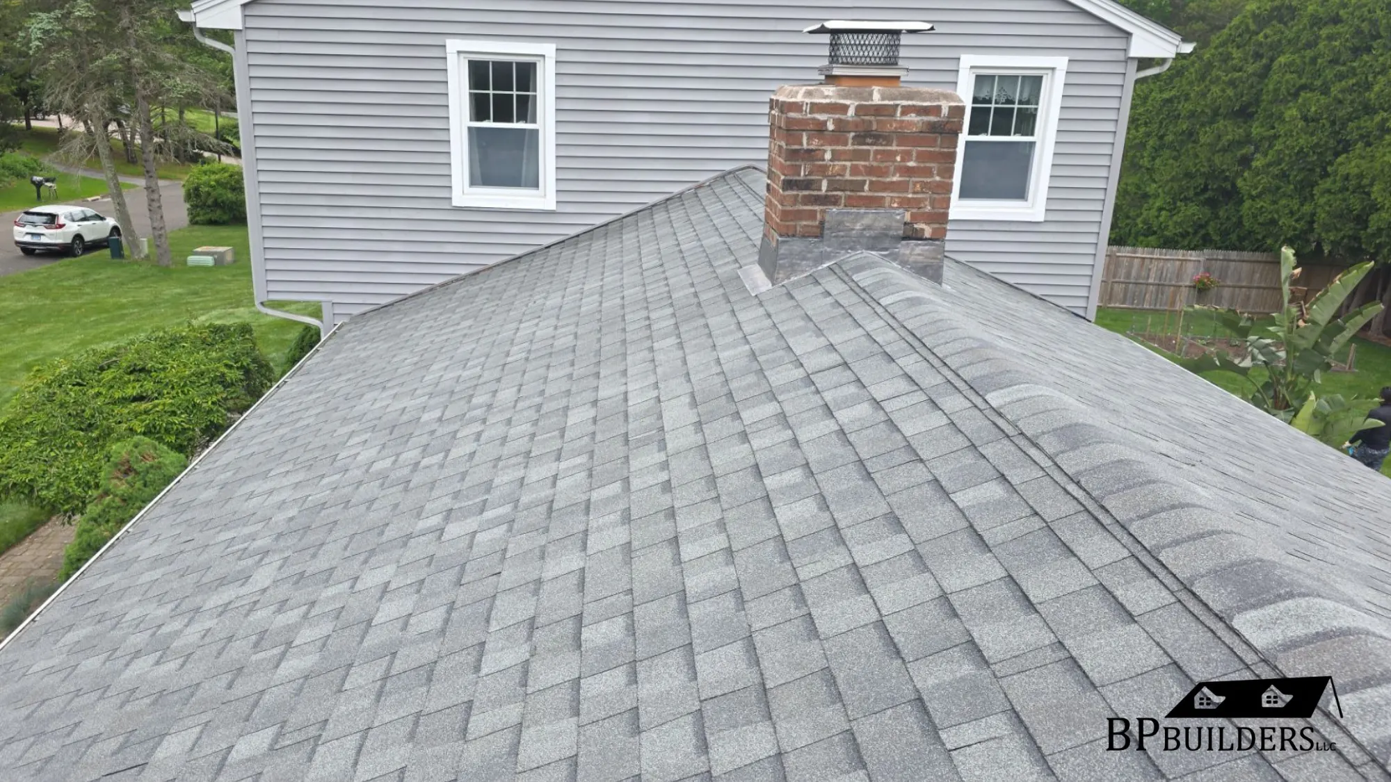 Bloomfield home with professionally installed asphalt shingle roofing